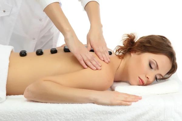 Beautiful young woman in spa salon getting massage with spa stones — Stock Photo, Image