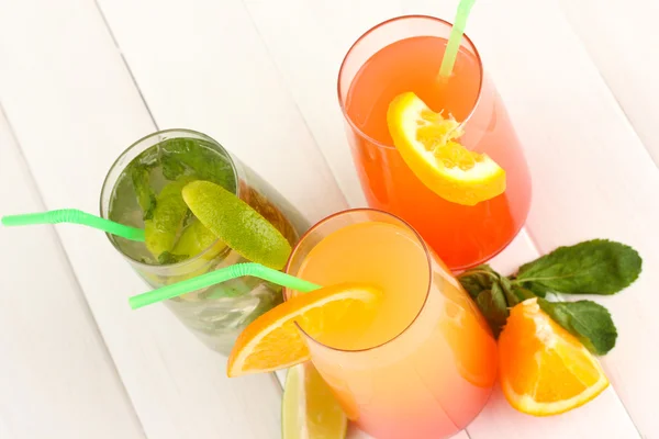 Three cocktails on white background — Stock Photo, Image