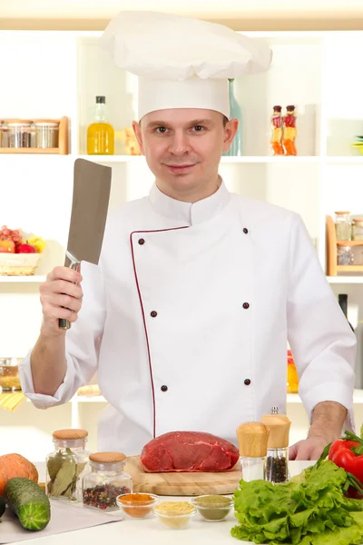 Chef cooking in kitchen — Stock Photo, Image