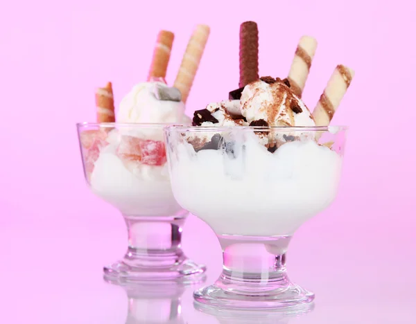 Ice cream with wafer sticks on pink background — Stock Photo, Image