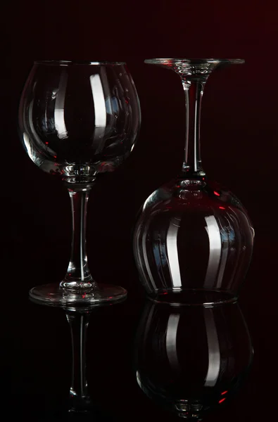 Two glasses on dark red background — Stock Photo, Image