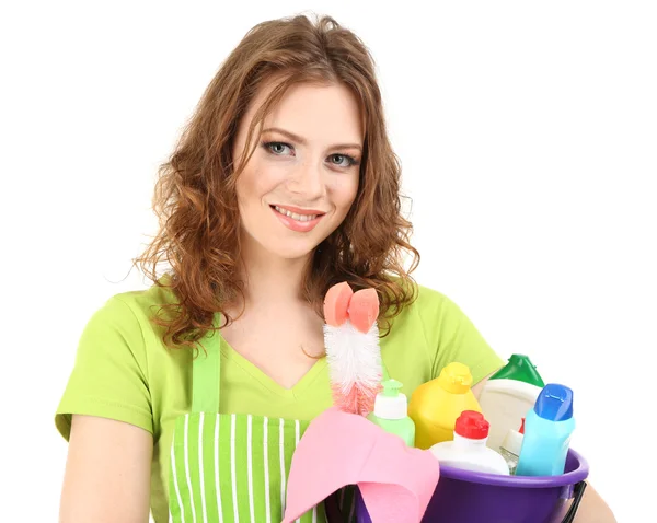 Female cleaner holding bucket with cleaning supplies isolated on white — Stock fotografie