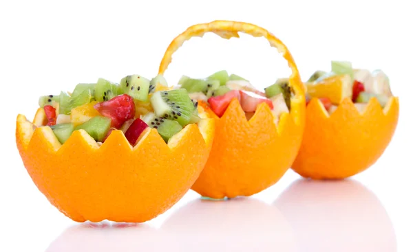 Fruit salad in hollowed-out orange isolated on white — Stock Photo, Image