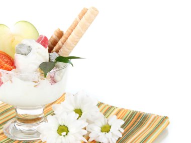 Ice cream with wafer sticks on napkin on white background clipart