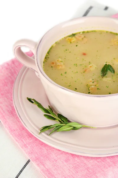 Nourishing soup with vegetables in pan isolated on white — Stock Photo, Image