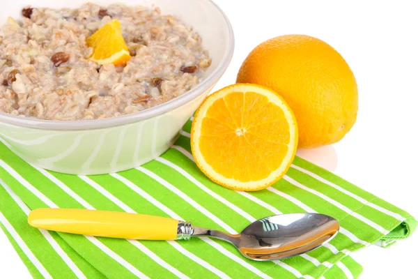 Useful oatmeal in bowl with fruit isolated on white — Stock Photo, Image