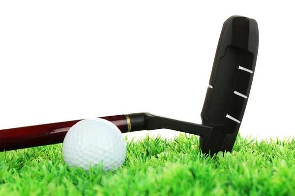 Golf ball and driver on grass isolated on white — Stock Photo, Image