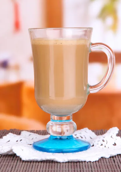 Layered coffee in glass on table on bright background — Zdjęcie stockowe