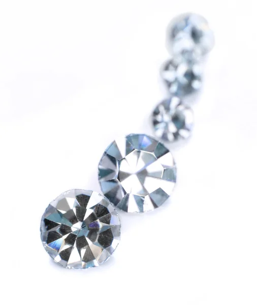 Prachtige schijnende kristallen (diamanten), geïsoleerd op wit — Stockfoto