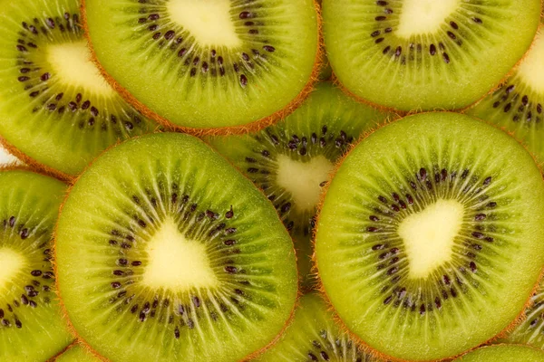 Kiwi segmenten achtergrond — Stockfoto