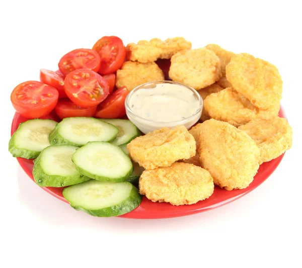 Fried chicken nuggets with vegetables and sauce isolated on white — Stock Photo, Image