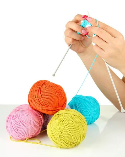 Hands of young woman knitting with blue wool, isolated on white — Stock Photo, Image