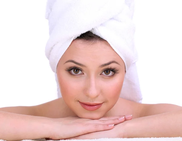 Beautiful young woman with towel on her head isolated on white — Stock Photo, Image