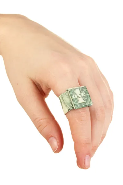 Dólar doblado en anillo en la mano de la mujer aislado en blanco — Foto de Stock