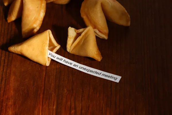Fortune cookies on wooden table — Stock Photo, Image