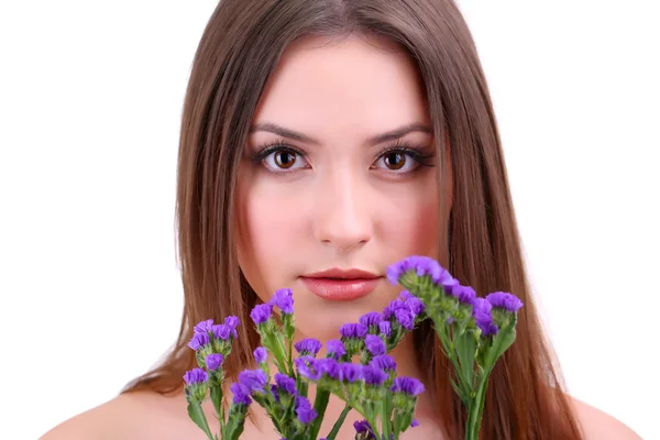 Vacker ung kvinna med blommor isolerad på vit — Stockfoto