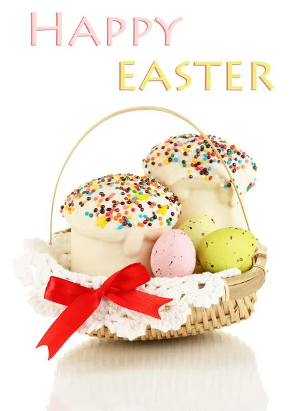 Easter cakes with eggs in wicker basket isolated on white — Stock Photo, Image