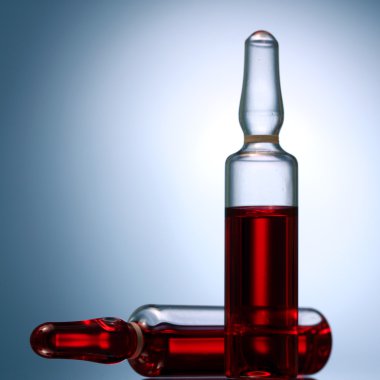 mavi arka plan üzerinde tıbbi ampul