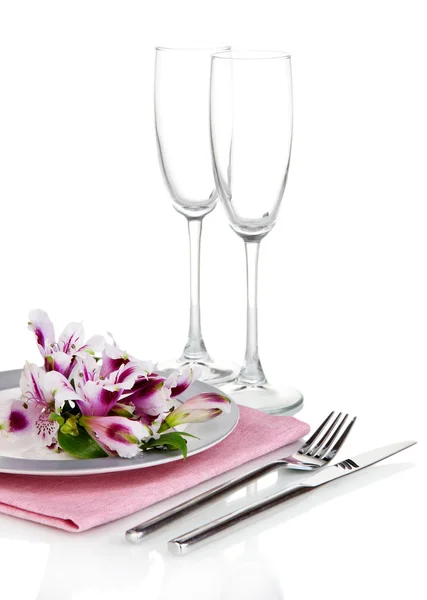 Festive table setting with flowers isolated on white — Stock Photo, Image