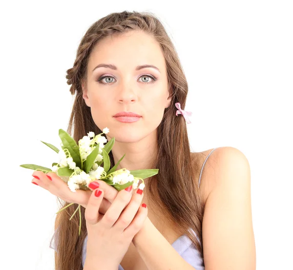 Jeune femme avec une belle coiffure et des fleurs, isolé sur blanc — Photo