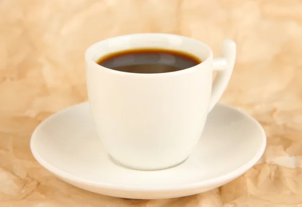 Taza de café fuerte sobre fondo beige —  Fotos de Stock