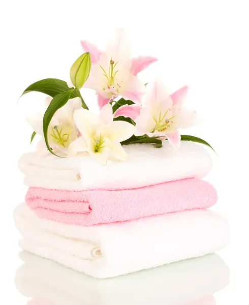 Hermoso lirio en toalla aislado en blanco —  Fotos de Stock