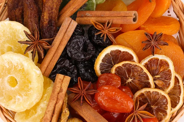 Dried fruits with cinnamon and anise stars close-up — Stock Photo, Image