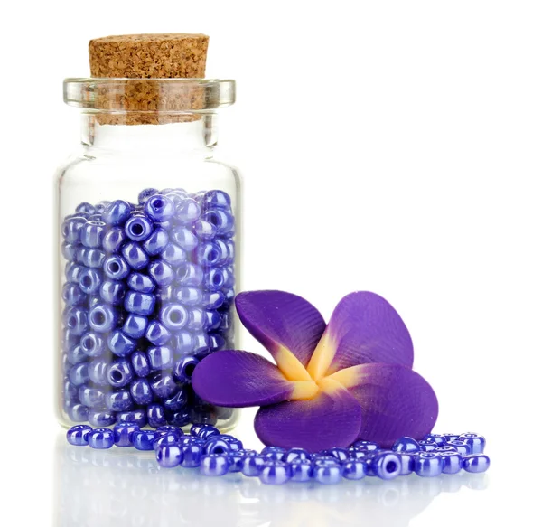 Little bottle full with colorful beads isolated on white — Stock Photo, Image