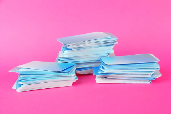 Stacks of business cards, on color background — Stock Photo, Image