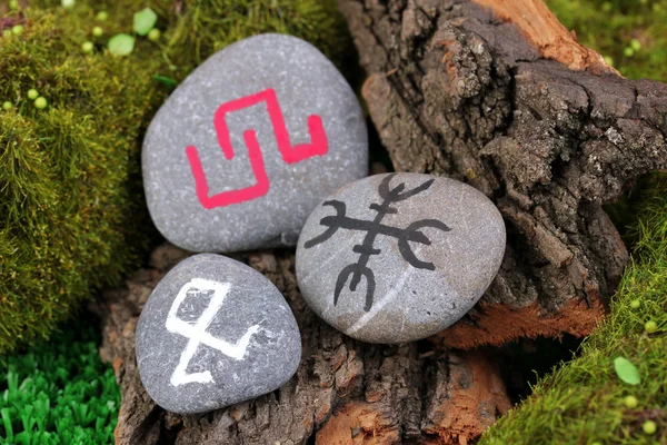 Fortune telling with symbols on stone close up — Stock Photo, Image