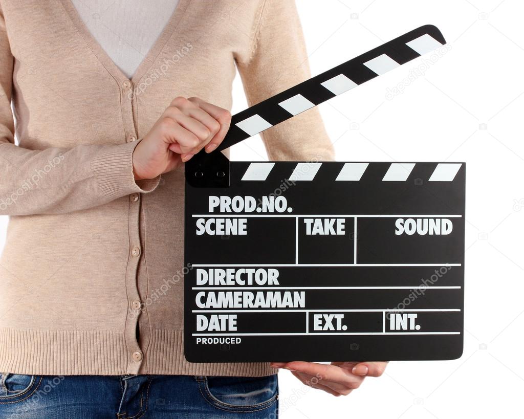 Movie production clapper board in hands isolated on white