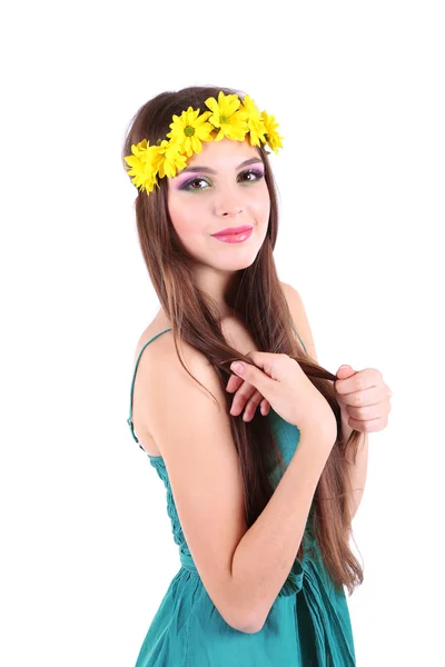 Young beautiful girl in green dress with bright wreath on her head, isolated on white — Stock Photo, Image