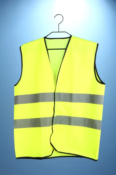 Yellow vest, on color background — Stock Photo, Image