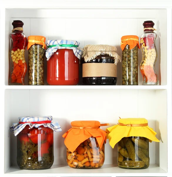 Homemade preserves on beautiful white shelves — Stok fotoğraf