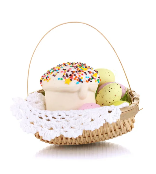 Easter cake with eggs in wicker basket isolated on white — Stock Photo, Image