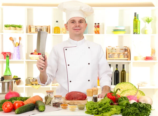 Chef cooking in kitchen — Stock Photo, Image