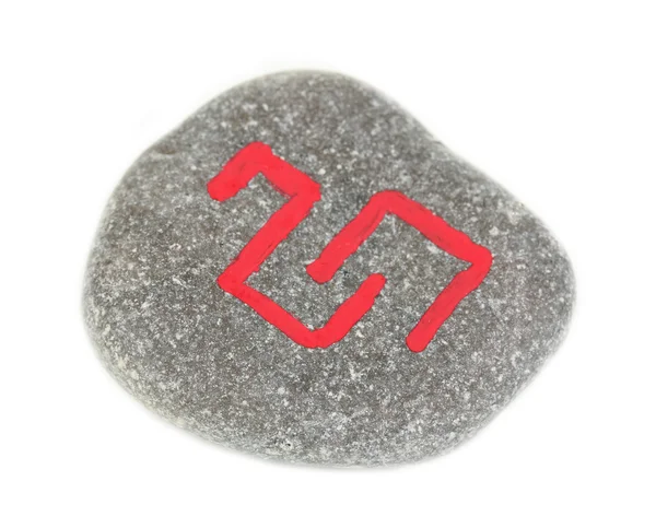 Waarzeggerij met symbolen op steen geïsoleerd op wit — Stockfoto