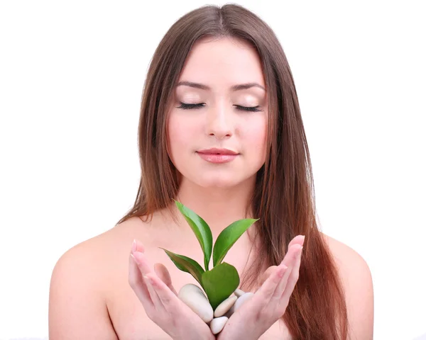 Beautiful young woman with green leafs isolated on white — Stock Photo, Image