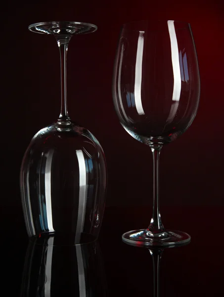 Two glasses on dark red background — Stock Photo, Image