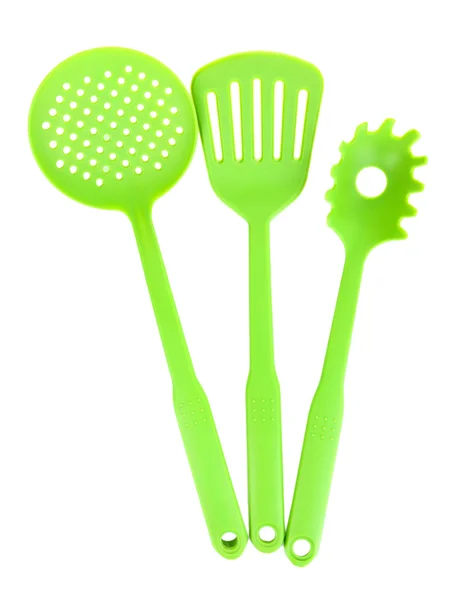 Green plastic kitchen utensil isolated on white — Stock Photo, Image