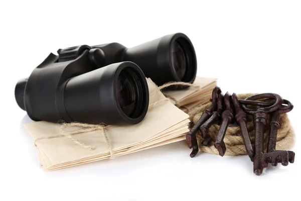 Black modern binoculars with old keys and letters isolated on white — Stock Photo, Image