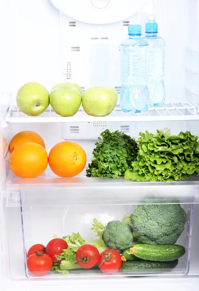 Open refrigerator with vegetarian food — Stock Photo, Image