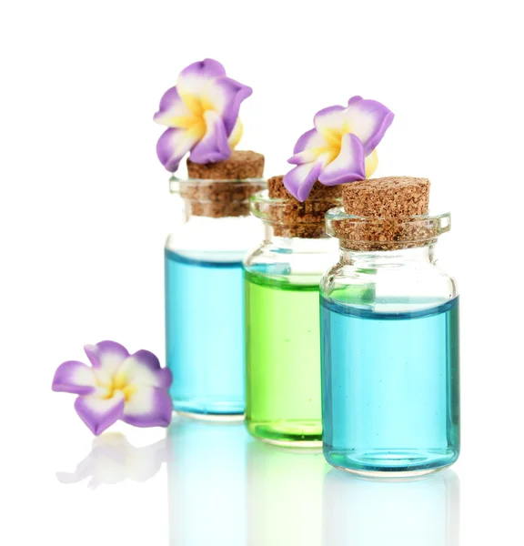Bottles with basics oils isolated on white — Stock Photo, Image