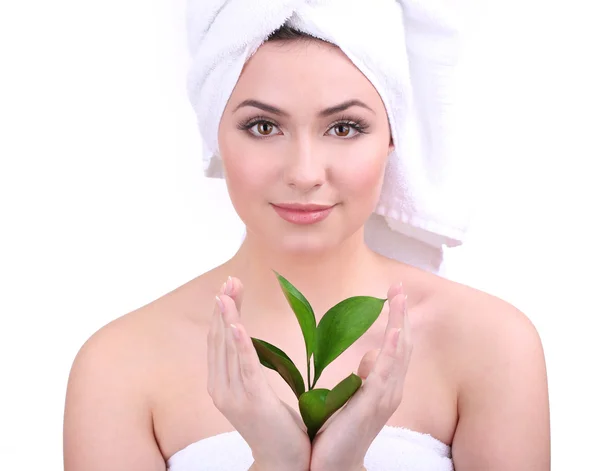 Beautiful young woman with green leafs isolated on white — Stock Photo, Image