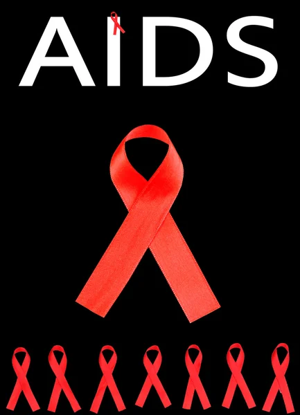 Aids awareness red ribbons isolated on black — Stock Photo, Image