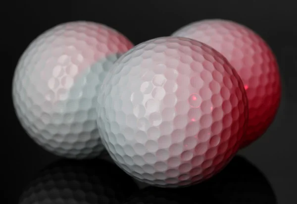 Golf balls on grey background — Stock Photo, Image