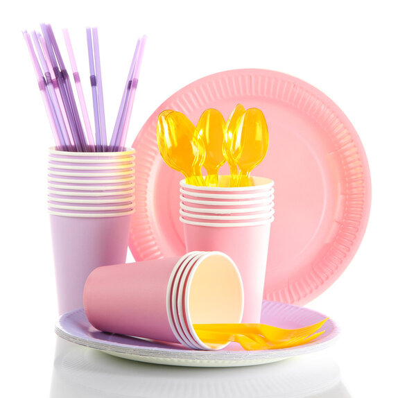 Multicolored plastic tableware isolated on white