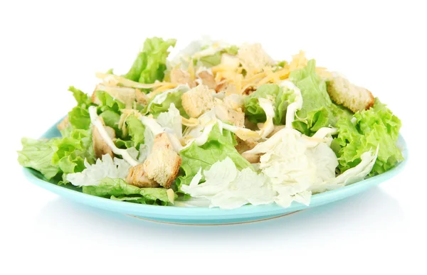 Caesar salad on blue plate, isolated on white — Stock Photo, Image