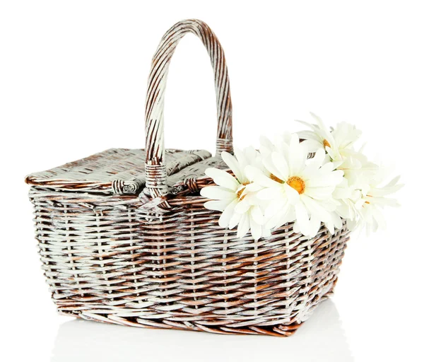 Picnic basket with flowers, isolated on white — Stock Photo, Image