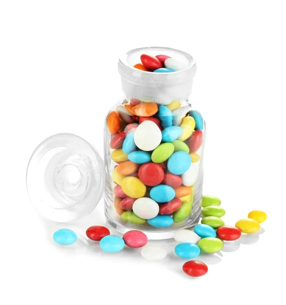 Colorful candies in glass jar isolated on white — Stock Photo, Image